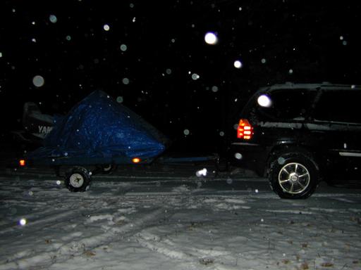 Matt's new Envoy loaded up with the snowmobile attached.
