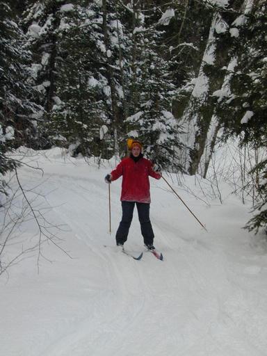 Amelia skiing down the not so deadly path back to the cabin.