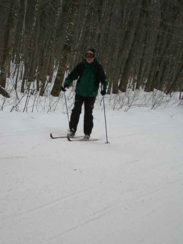 Bill skiing to the cabin from the trailhead.