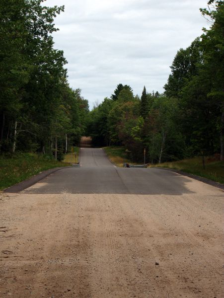 The "super bridge" that was formerly the one
		  lane bridge. Besides the bridge the road on both sides of
		  it was paved for a ways.