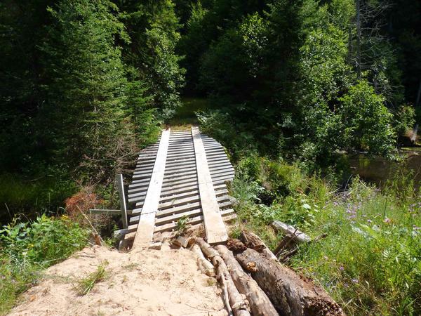 Bridge across the river.  It is much more solid than it looks.