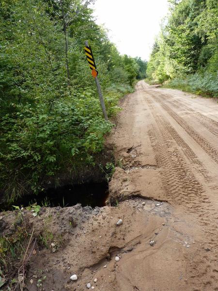 Eroding culvert on McCloud Grade near the Cabin.