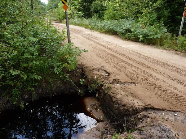 Eroding culvert on McCloud Grade near the Cabin.