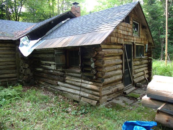 The wall of the cabin that clearly needs to be rebuilt!