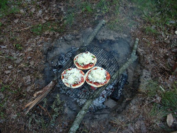 Pizzas on the grill.