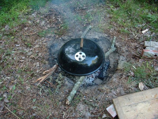 Pizzas covered completing the poor man's pizza oven.