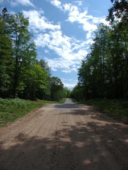 Approach the extremely nice and out of place looking bridge along Old Seney.