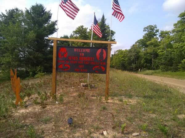 Sign at the turn off from M-77 at Lavendar Corner. "Seney Heightz"?