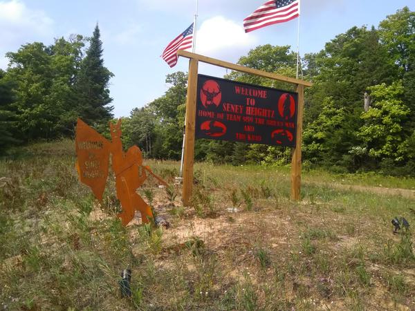 Sign at the turn off from M-77 at Lavendar Corner. "Seney Heightz"?