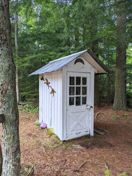 Fancy outhouse at Clayborn's camp.