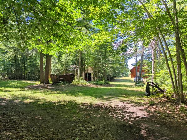 Camp on Kennedy Lake with a large, old snowplow.