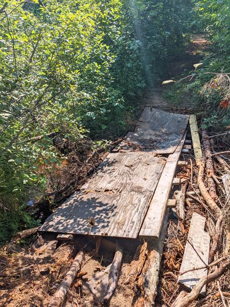 Precarious bridge over the Sucker River.