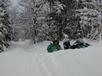 Matt unloading the snowshoes at the entrance to the cabin.