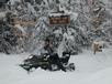 Matt working on the path with the snowmobile he rented.