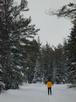 Matt skiing out from the cabin.