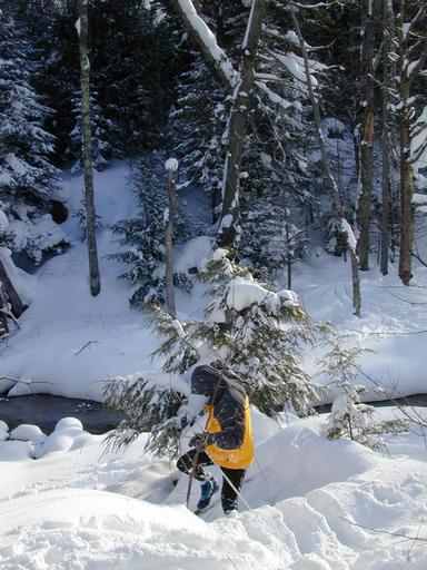 Matt climbing the river bank.