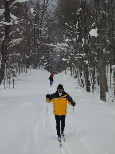 Matt, Vittoria, and Amelia skiing.