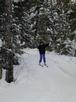 Vittoria skiing down the deadly path back to the cabin.