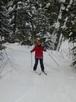 Amelia skiing down the not so deadly path back to the cabin.