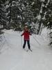 Amelia skiing down the not so deadly path back to the cabin.