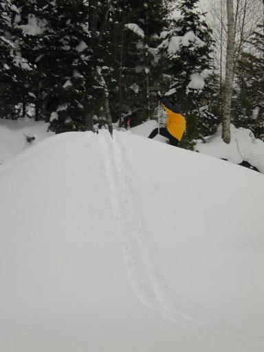 Matt climbing a steep hill.