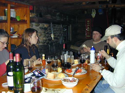 Amelia, Vittoria, Jon, and Matt eating dinner.