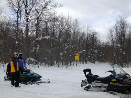 Us parked near the warning signs.