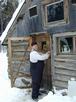 Jon locking up the cabin.