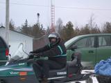 Me with my toys (snowmobile and new car).