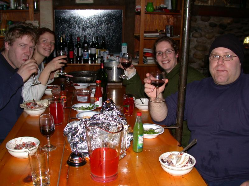 Bill, Vittoria, Amelia, and Jon eating dinner.