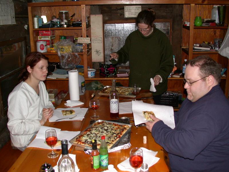 Vittoria, Amelia, and Jon eating.