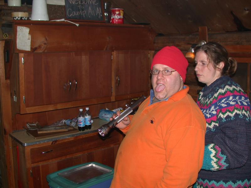 Jon (doing who knows what) and Amelia in the kitchen.