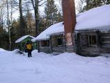 Matt snowshoeing out from the cabin.