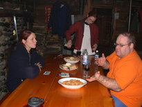 Vittoria, Amelia, and Jon preparing for dinner.