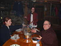 Vittoria, Amelia, and Jon with dinner being served.