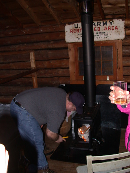 Jon lighting the new stove for the first time.