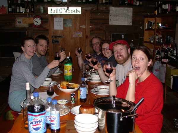 Katie, John, Jon, Amelia, Bill, and (a surprised?)
		  Vittoria toasting before dinner.