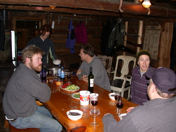 Bill, Amelia, John, Katie, and Jon at dinner of black
		  beans and rice.