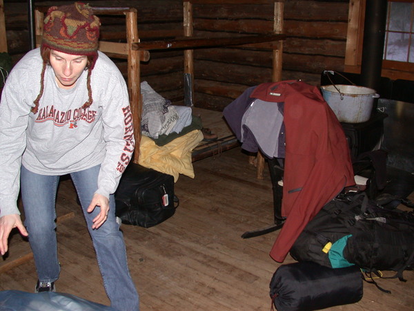 Amelia cleaning in the bunk room.