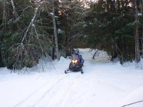 First arrival on snowmobile.