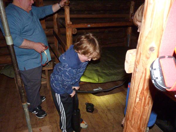 Teddy pumping up his air mattress.