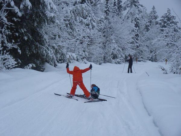 Bill watching Frankie and Teddy falling as they ski on McCloud Grade.