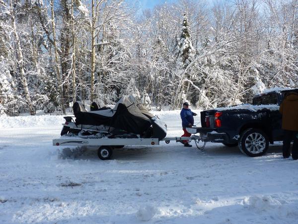 Snow mobiles loaded up for the return home.