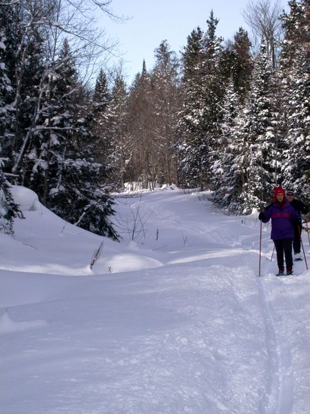 Amelia and Jon snowshoeing along McCloud Grade.