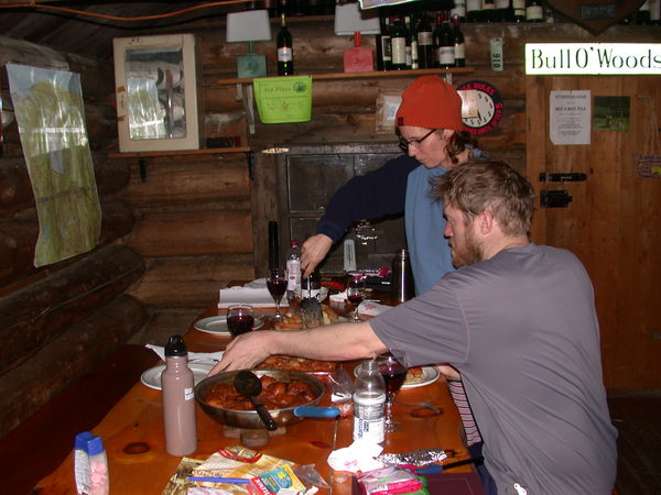 Bill and Amelia laying out the feast of meatballs and lasagne.