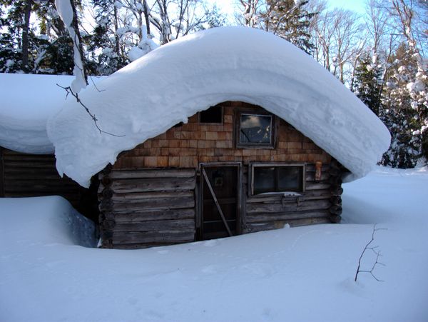 Kitchen door buried in snow.