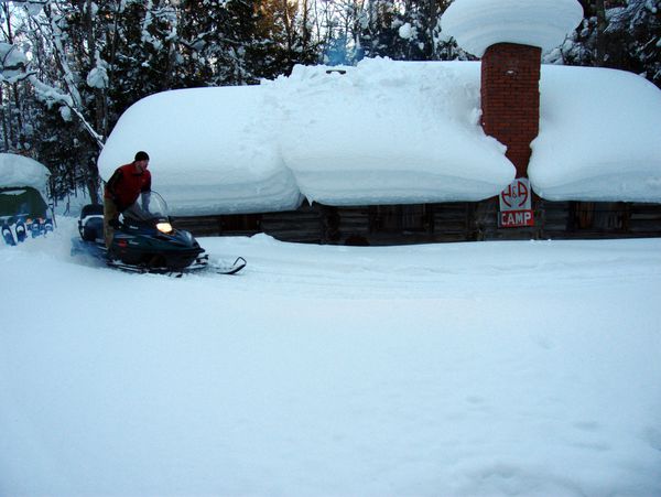 Paul flattening the path near the Cabin.