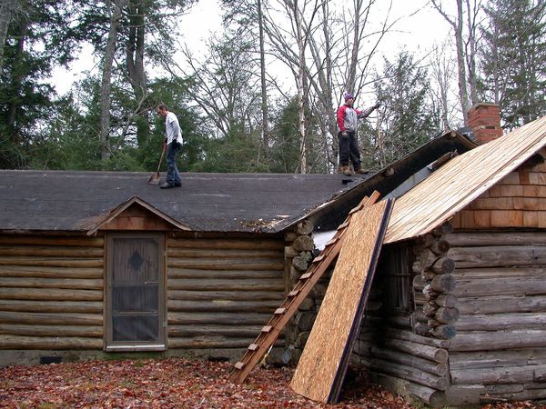 Shingles removed from the back half of the cabin.