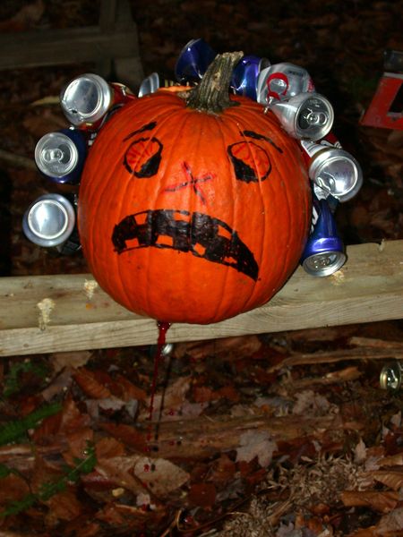 Pumpkin leaking red gelatin after getting shot.