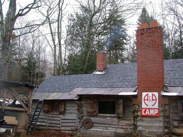 The cabin completely reshingled.